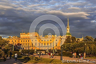 View of the Mikhailovsky Engineering castle from the side of the field of Mars at sunset. Saint Petersburg Editorial Stock Photo