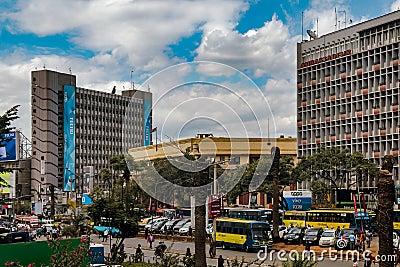 View of Moi Avenue Street with public transport vehicles and people on a busy day in Nairobi, Kenya Editorial Stock Photo