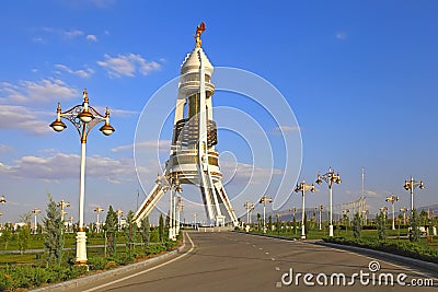 View on the Monument Neutrality Arch from park. Ashkhabad. Turkmenistan Editorial Stock Photo