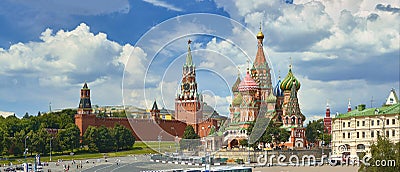 View on Moscow Red Square, Kremlin towers, stars and Clock Kuranti, Saint Basil`s Cathedral church. Hotel Russia Moscow Red Square Stock Photo