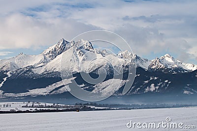 View of mountain peaks and snow in winter time, High Tatras Stock Photo