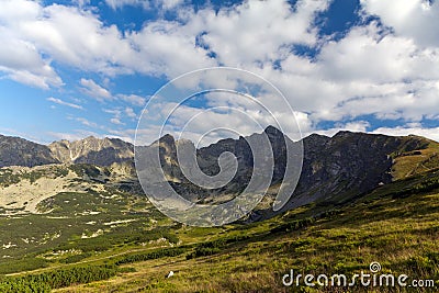 View on mountais in summer and blue sky with clouds Stock Photo