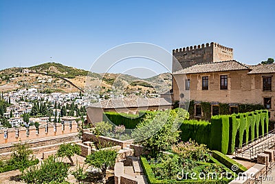 View of the Nasrid Palaces Palacios NazarÃ­es and gardens in front of them in Alhambra Stock Photo