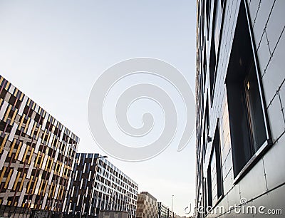 View on new modern buildings, facade corner and sky, parkings on line Stock Photo