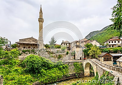 Nezir Agina Mosque and Crooked bridge in Mostar, Bosnia and Herzegovina Stock Photo