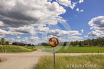 View of NO LEFT TURN road sign on road cross. Beautiful countryside landscape view. Stock Photo