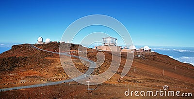 View of observatories from summit of Haleakala volcano Stock Photo