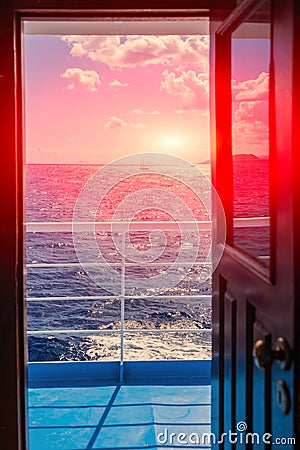 View on the ocean and yachts from open door of captain cabin Stock Photo