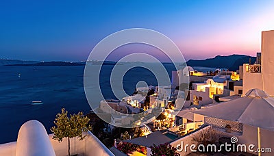 Oia village at the sunset - Aegean sea - Santorini island - Greece Stock Photo