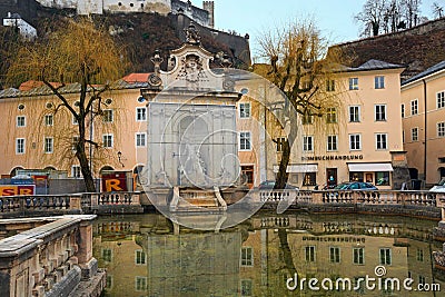 View of the old Horse Well at the Kapitelplatz Square. Salzburg, Lower Austria Editorial Stock Photo