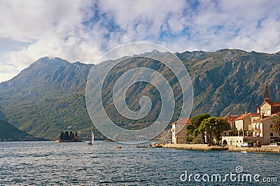 View of old Mediterranean town of Perast and two small islands. Bay of Kotor, Montenegro Stock Photo