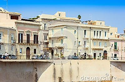 View of old street, facades of ancient buildings in seafront of Ortygia Ortigia Island, Syracuse, Sicily, Italy Editorial Stock Photo