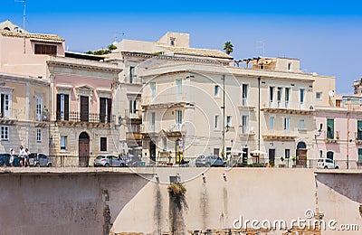 View of old street, facades of ancient buildings in seafront of Ortygia Ortigia Island, Syracuse, Sicily, Italy Editorial Stock Photo