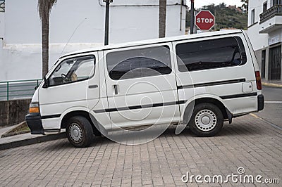 An old white Toyota Hiace van parked outdoors Editorial Stock Photo