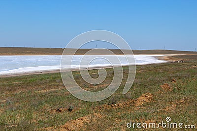 View of one of the salt lakes in the Astrakhan steppe on a sunny day. Russia Stock Photo