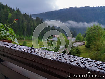 Nasty outside, cosy inside. View over stairlift in Slavske village. Skiing and hiking up to Trostyan mountain Stock Photo