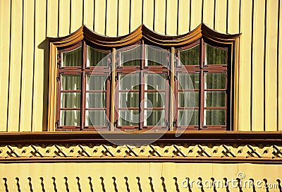 Ornamented rustic window Stock Photo