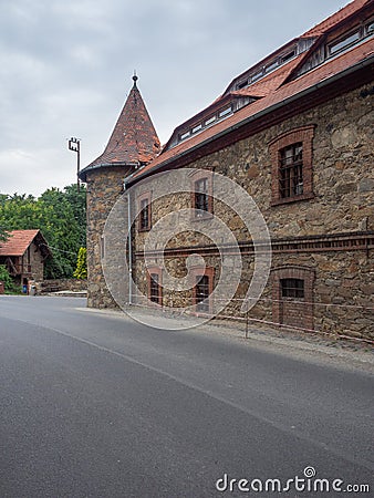 View on the outer buildings of the Czocha Castle from the road leading to the main entrance Editorial Stock Photo