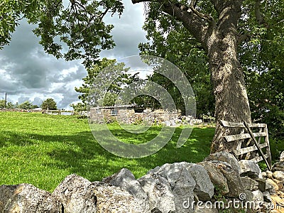 View over a dry stone wall in, Kildwick, Keighley, UK Stock Photo