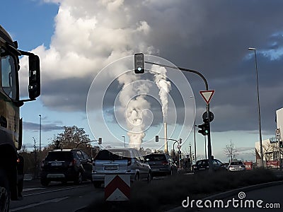 Industrial cars traffic light exhaust chimney smoke Editorial Stock Photo