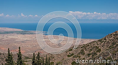 View over Issyk Kul lake from Fairy Tale canyon Skazka Canyon, a desert area near Bokonbayevo in Kyrgyzstan Stock Photo