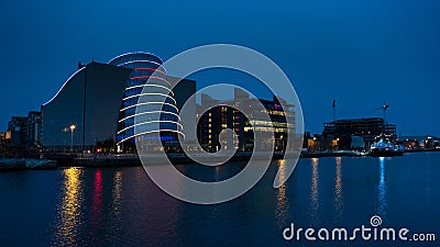 Modern Convention Centre in Dublin, Ireland at night with reflections in river Editorial Stock Photo