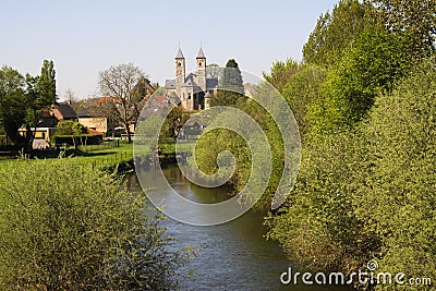 View over small river Rur on basilica of Sint Odilienberg near Roermond - Netherlands Stock Photo