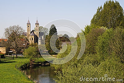 View over small river Rur on basilica of Sint Odilienberg near Roermond - Netherlands Stock Photo