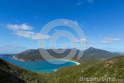 View over turquoise waters of Wineglass Bay in Freycinet National Park, Tasmania island, Australia. Stock Photo