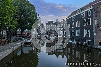 View over a typical canal in the Dutch metropolis Amsterdam in summer 2023 Editorial Stock Photo