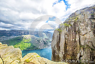 View over the world famous Preikestolen - or pulpit rock - over the Lysefjord. Stock Photo