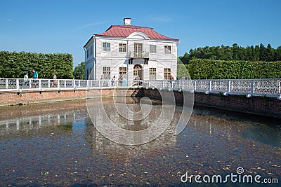 View of the Palace of Marly on sunny day in July. Saint Petersburg Editorial Stock Photo