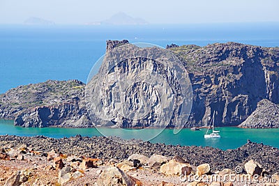 View of Palea Kameni island from volcano in Nea Kameni near Santorini, Greece Stock Photo