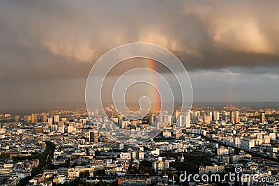 View of Paris from above. Rain, clouds, rainbow. Stock Photo