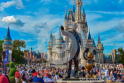 View of Partners Statue This statue of Walt Disney and Mickey Mouse is positioned in front of Cinderella Castle in Magic Kingdom Editorial Stock Photo