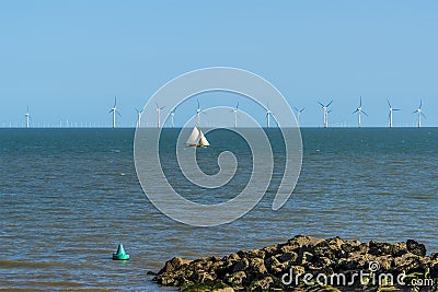 A view past sea defenses out to sea at Clacton on Sea, UK Stock Photo