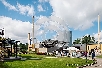 View of people visiting the first solar collector field for centralized heating in Latvia Editorial Stock Photo