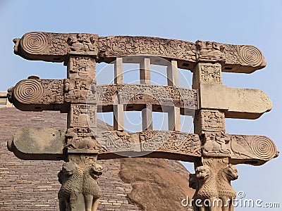 View of pillars & restored front architraves at the Southern Gateway, Great Stupa, Sanchi Buddhist complex, Madhya Pradesh, India Editorial Stock Photo