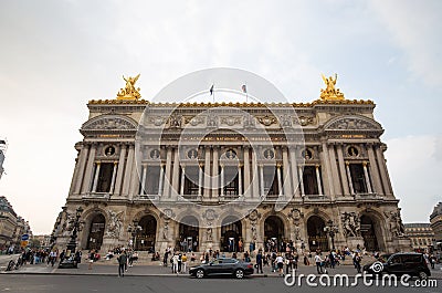 View of Place de l`Opera and Opera de Paris building. Grand Opera Garnier Palace is famous neo-baroque building in Paris, France Editorial Stock Photo