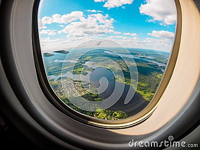 View of the planet Earth through the airplane porthole Stock Photo