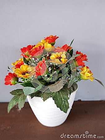 View of Plastic Flowers on The Table at The Cafetaria Stock Photo