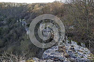 View from plateau to environment with deep cliff of Demir Baba Teke, cult monument honored by both Christians and Muslims Stock Photo