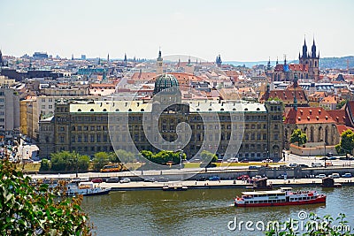 View of Prague with Vltava and amazing buildings with red roofs. Editorial Stock Photo