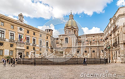 View of Pretoria Fountain with San Giuseppe dei Teatini church dome in the background in Palermo. Editorial Stock Photo