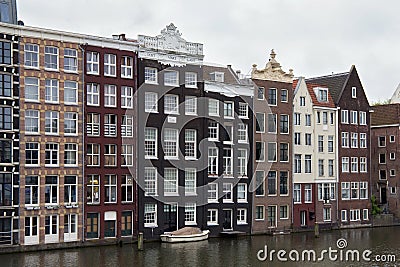 View from the Prins Hendrikkade street in Amsterdam to the old historical dutch buildings. Stock Photo