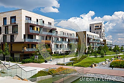 View of public park with newly built modern block of flats Stock Photo