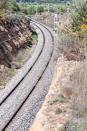 View of railroad rails with rails and catenary Stock Photo