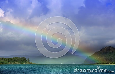 View of a rainbow from Daydream Island Stock Photo