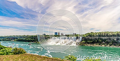 View at the Rainbow International bridge over Niagara river with American falls and Bridal Veil falls at USA territory. Editorial Stock Photo