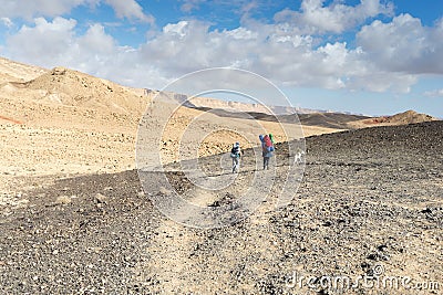 Trekking in Negev dramatic stone desert, Israel Editorial Stock Photo